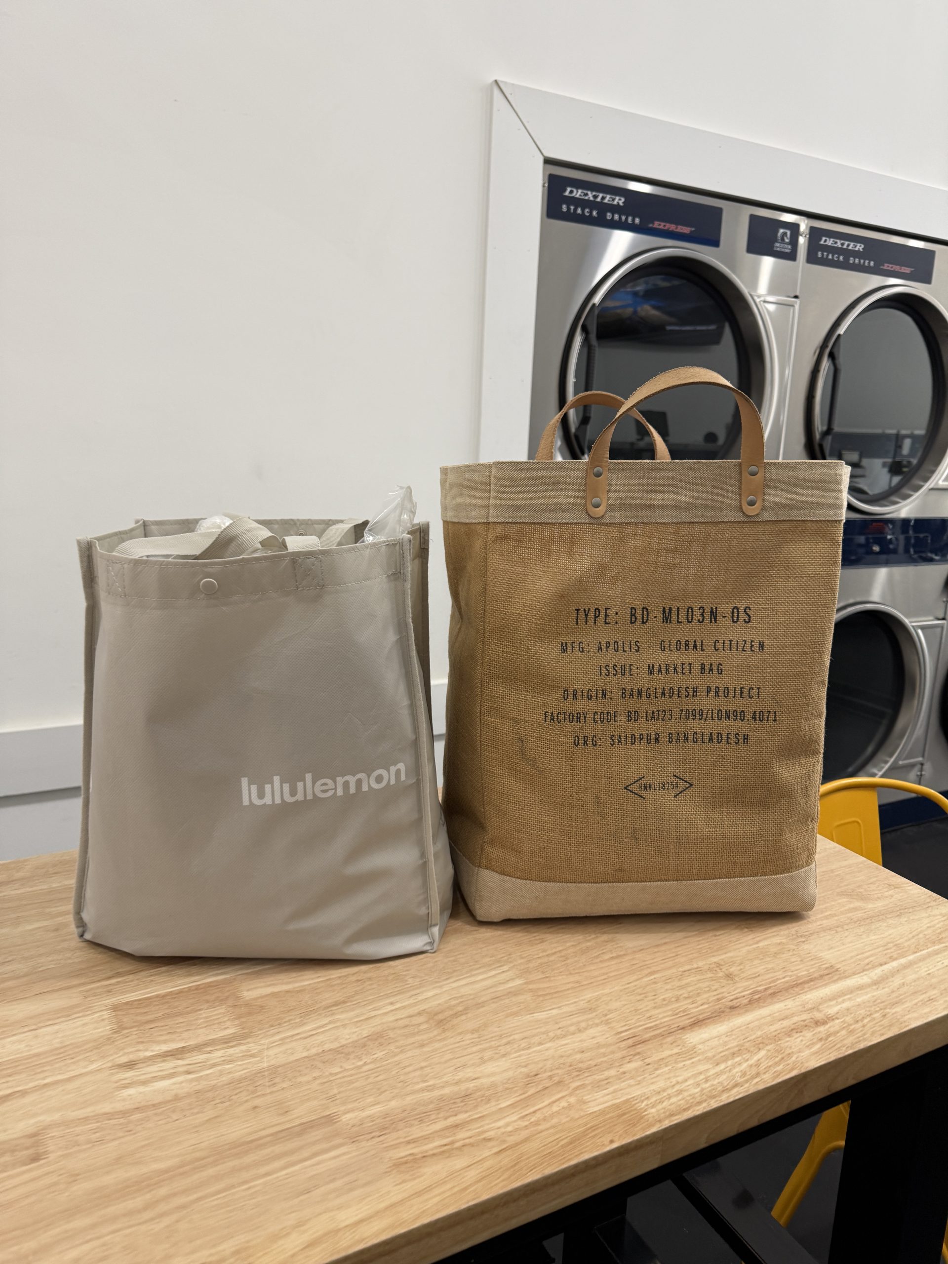Folded clothing and bedding prepared by The Laundry California